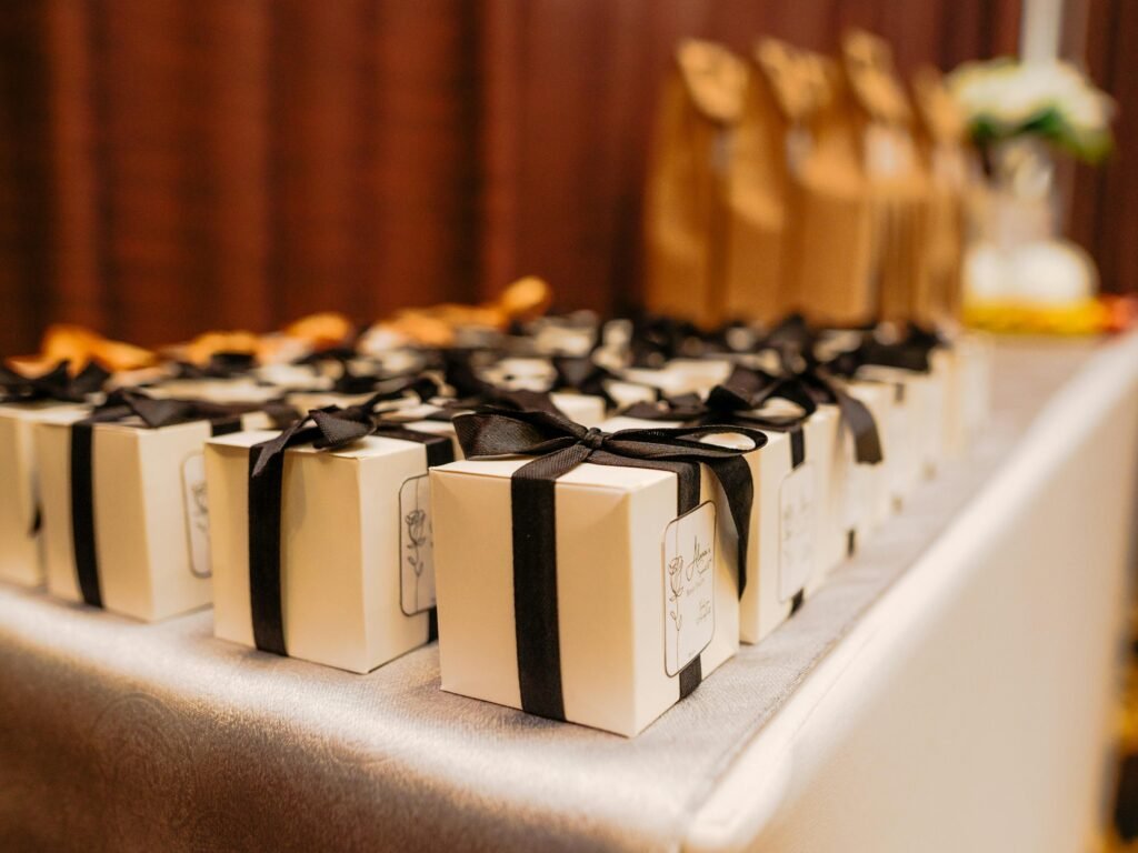 Stylish gift boxes with black ribbons elegantly arranged, perfect for events or celebrations.